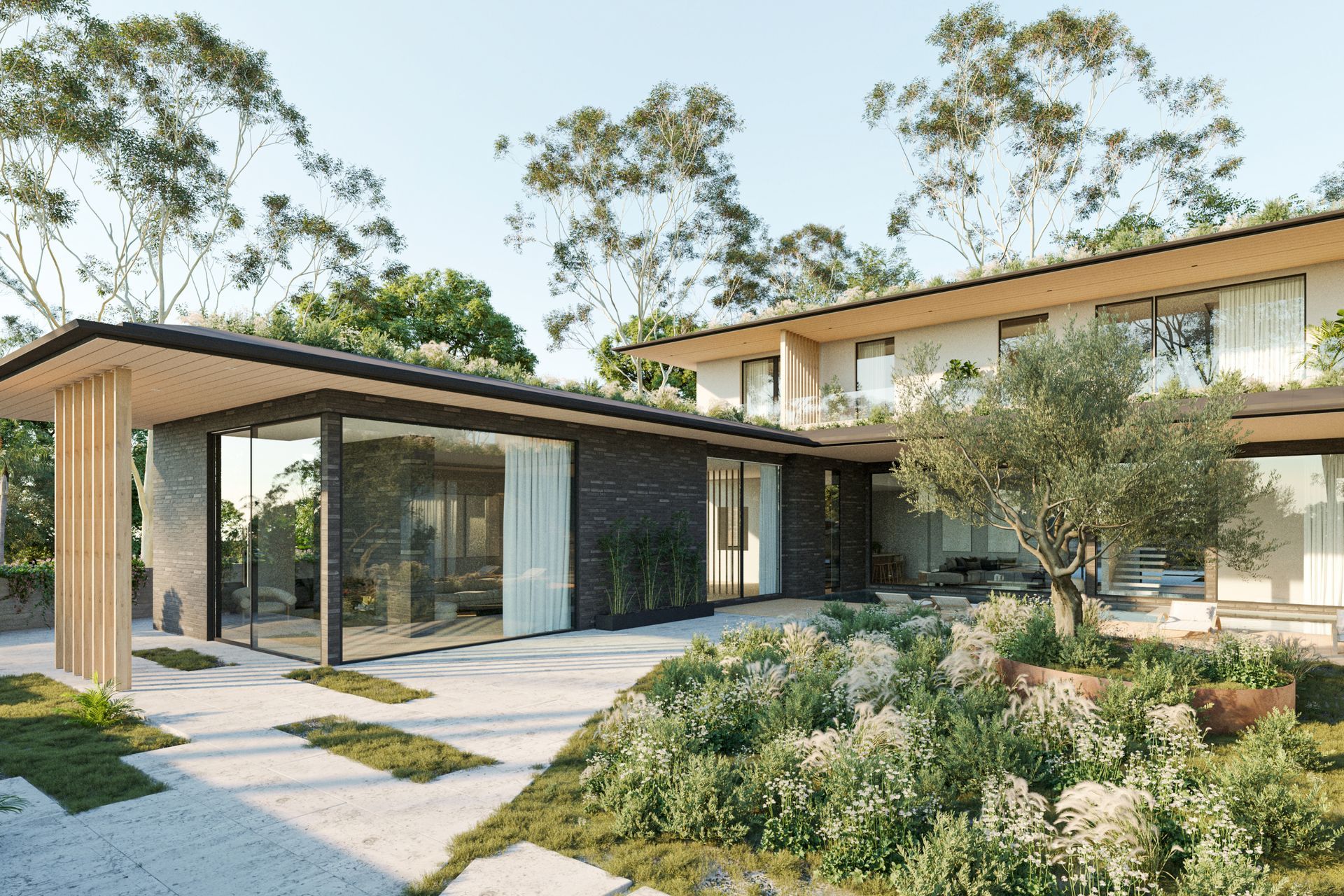 The U-shaped, two-level plan encloses a pool and landscaped patio in the private backyard. Green roofs help naturally cool the home while blending it with the natural surrounds.