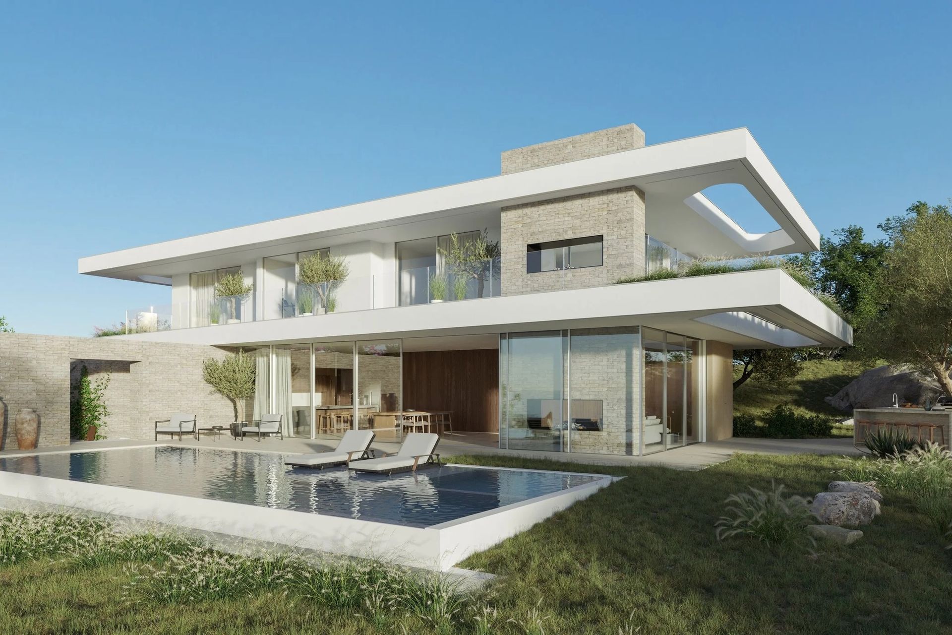 The open-plan living spaces are situated on the first level and spill onto a pool and yard via
floor-to-ceiling glass sliders. Bedrooms with balconies are situated above to capture
breathtaking view