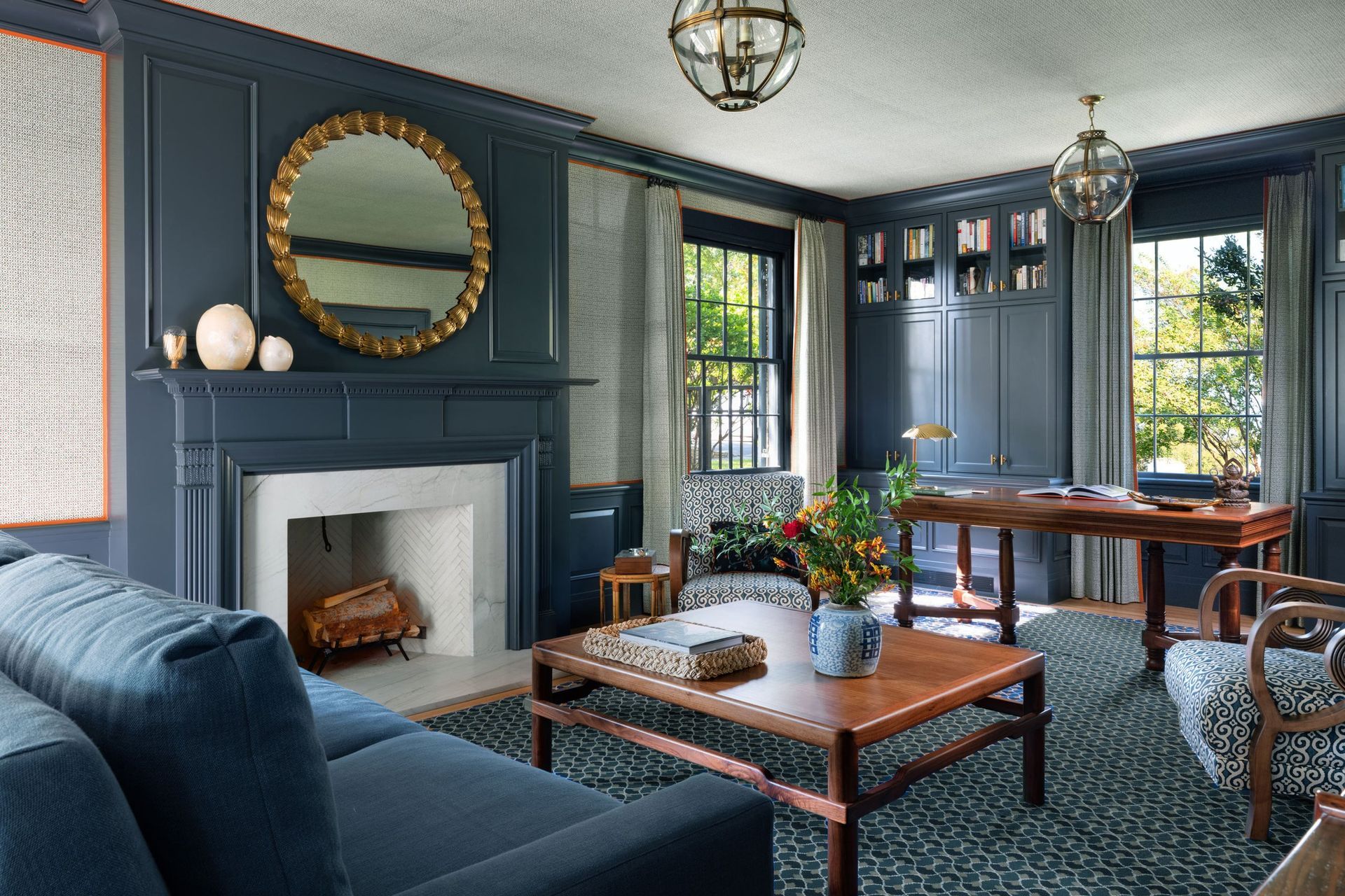 3PembertonHeightsCuppett-KilpatrickArchitectureandInteriorDesignelegant-blue-living-room-fireplace-built-in-bookshelves-marble-mantel-austin-tx.jpg