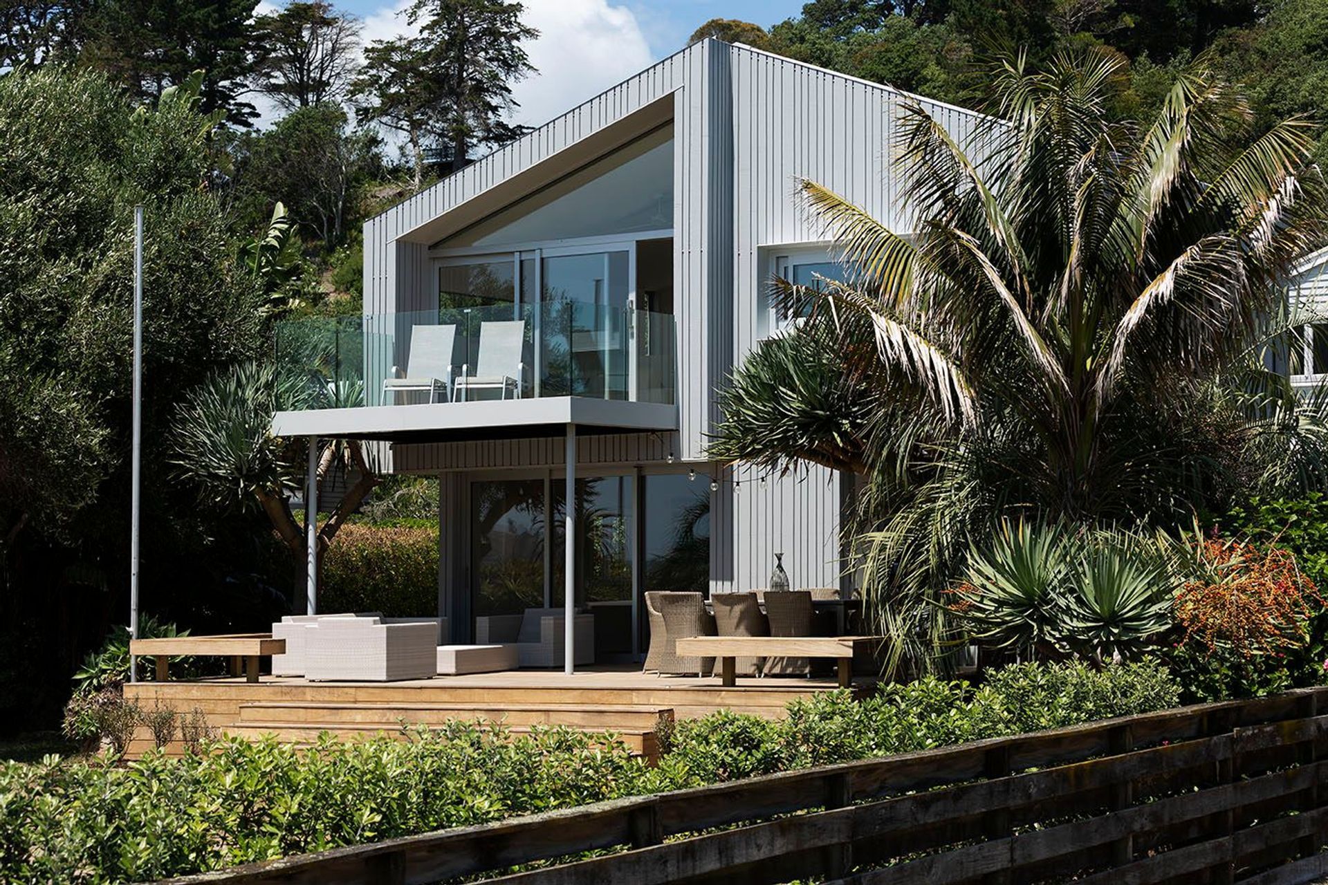 Nestled in developed planting, the vertical panels stand out beautifully