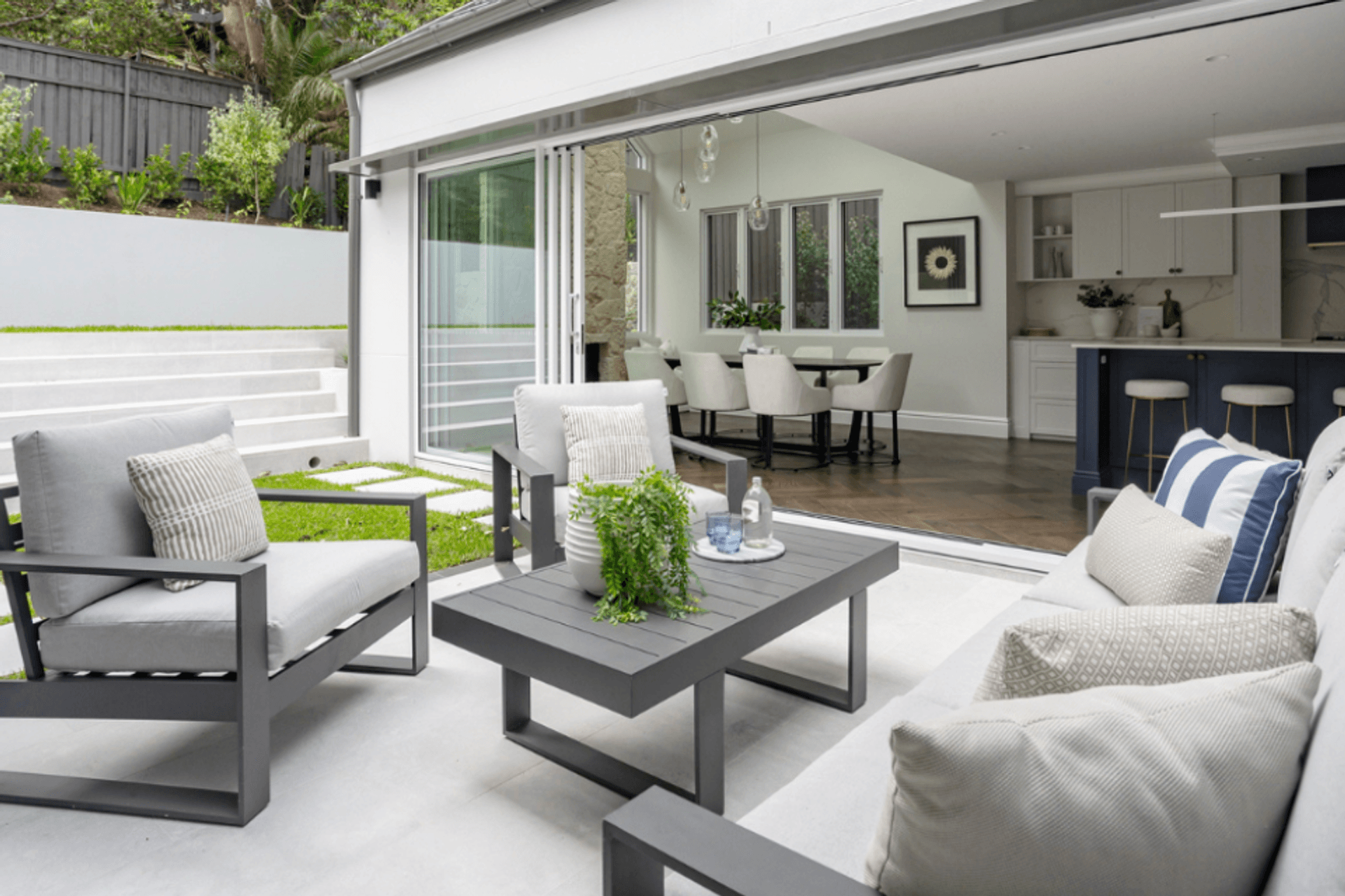 Luna Chiaro Limestone outdoor terrace connects indoor and outdoor living at this Mosman family residence.