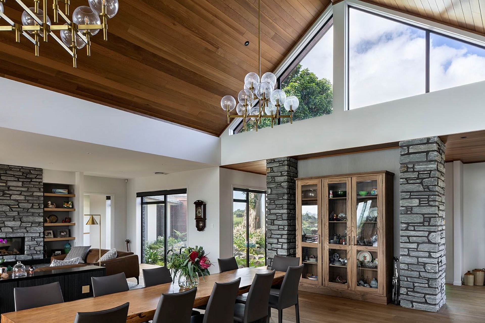Many apertures focus on the tree features in front of the home
