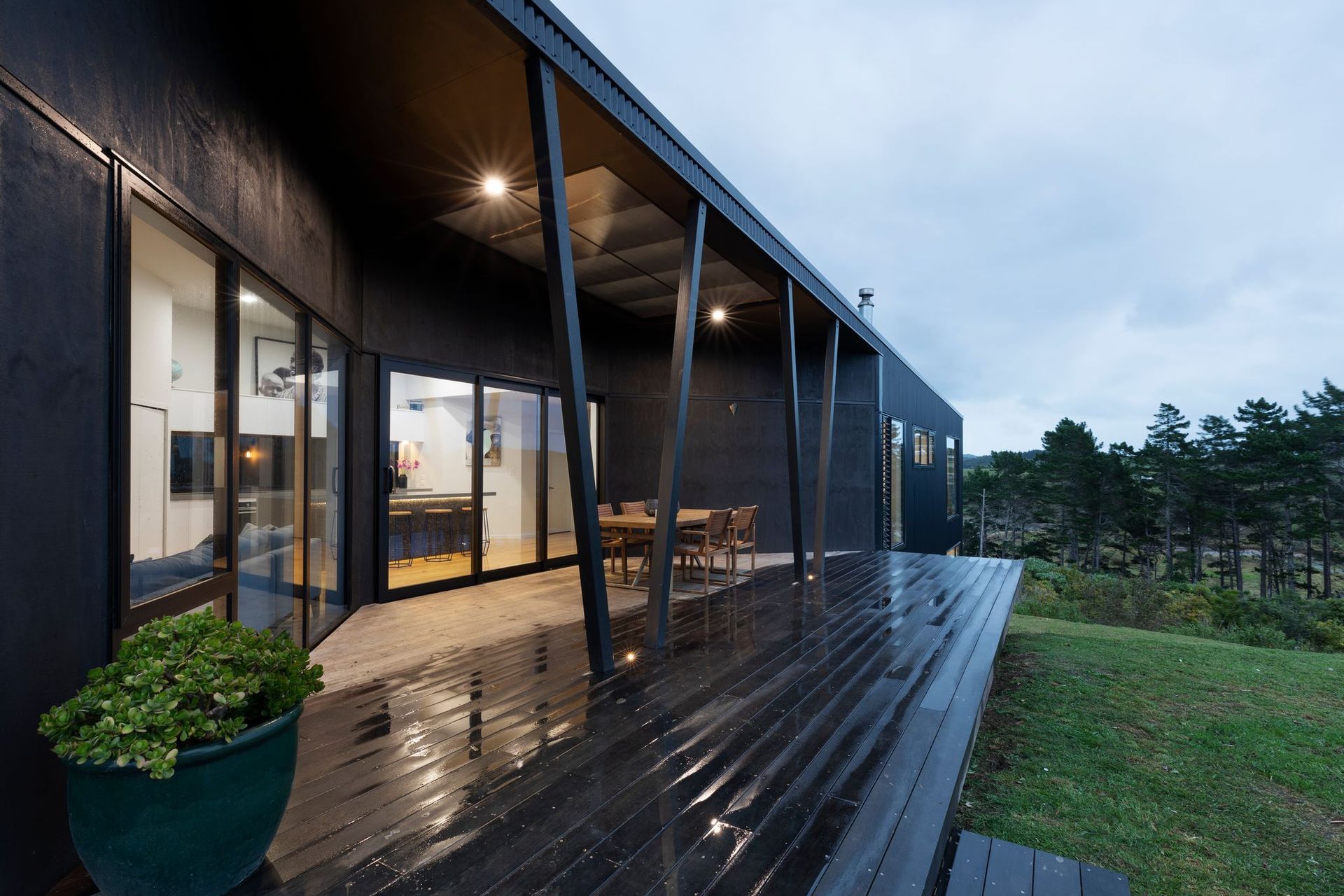 The home is intended to be elegantly brutal, with a dominant mass and monotone palette—chosen to impart a sense of permanence and practicality.