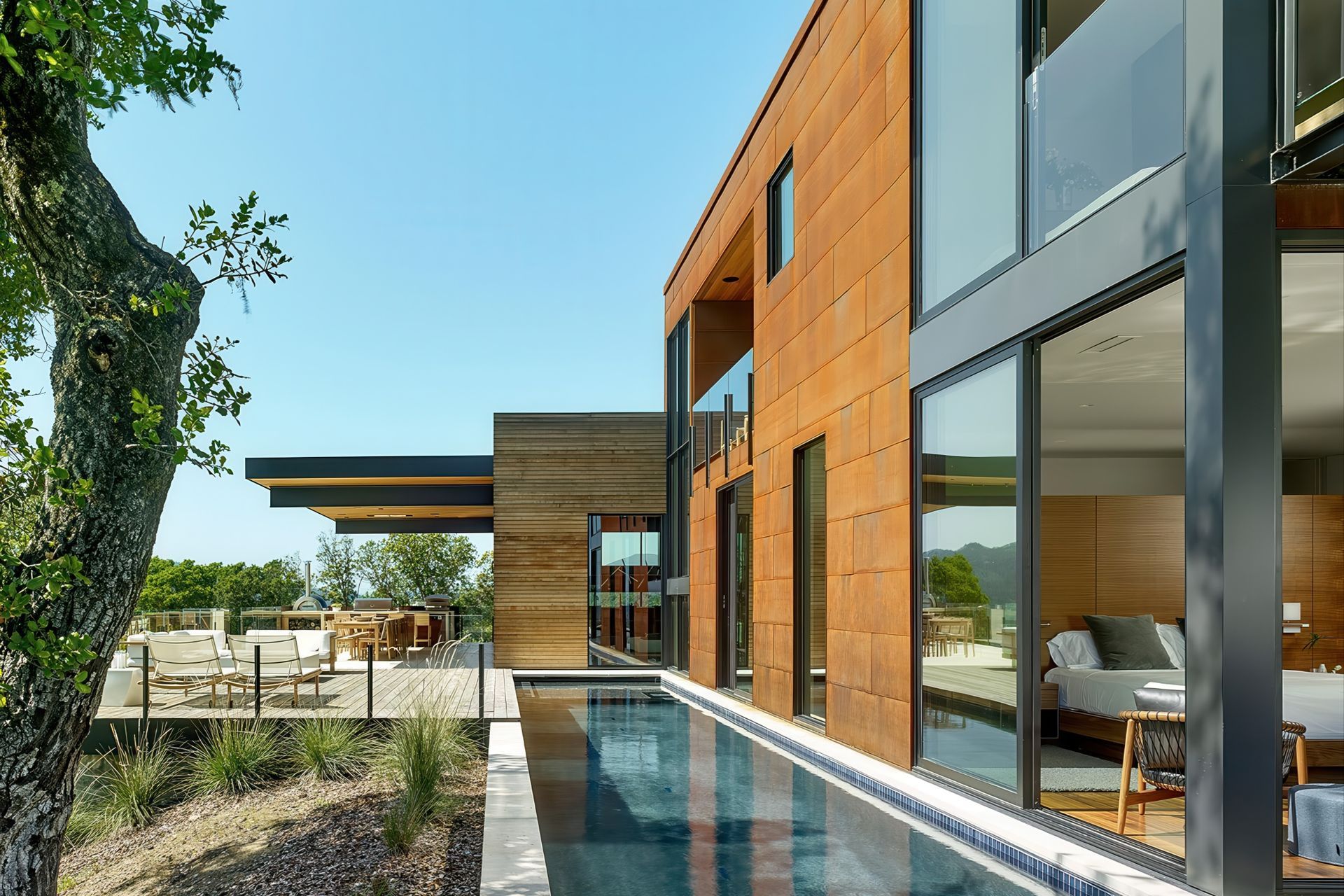 007Zack-de-VitoModern-Architecture-Construction-Design-BuildRidgeview-Estate-NapaCustom-HomePool-to-viewCesar-RubioExteriorViewPoolDeckPatioChairsCesar-Rubio.jpeg