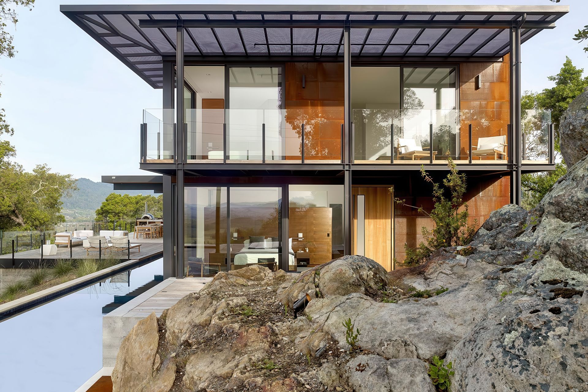 011Zack-de-Vito-Architecture-ConstructionModernRidgeViewHouseNapaEntryConcreteGlassWoodPatioWater-v3.jpeg