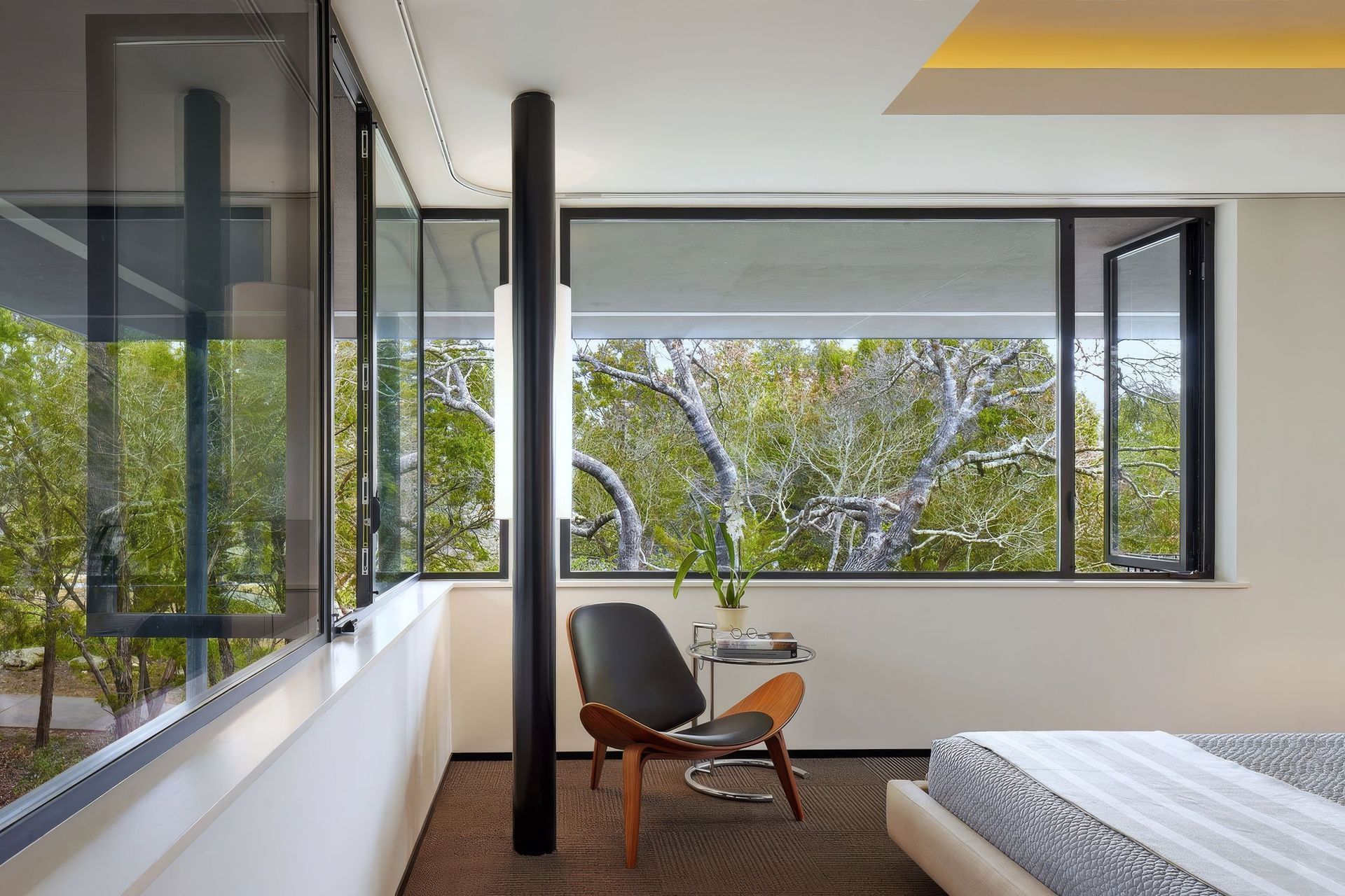 16HouseinTreesCuppettKilpatrickArchitectureandInteriorDesignaustin-tx-bedroom-cove-ceiling-led-lighting-modern-furniture-upscaled-by-Replicate.jpg