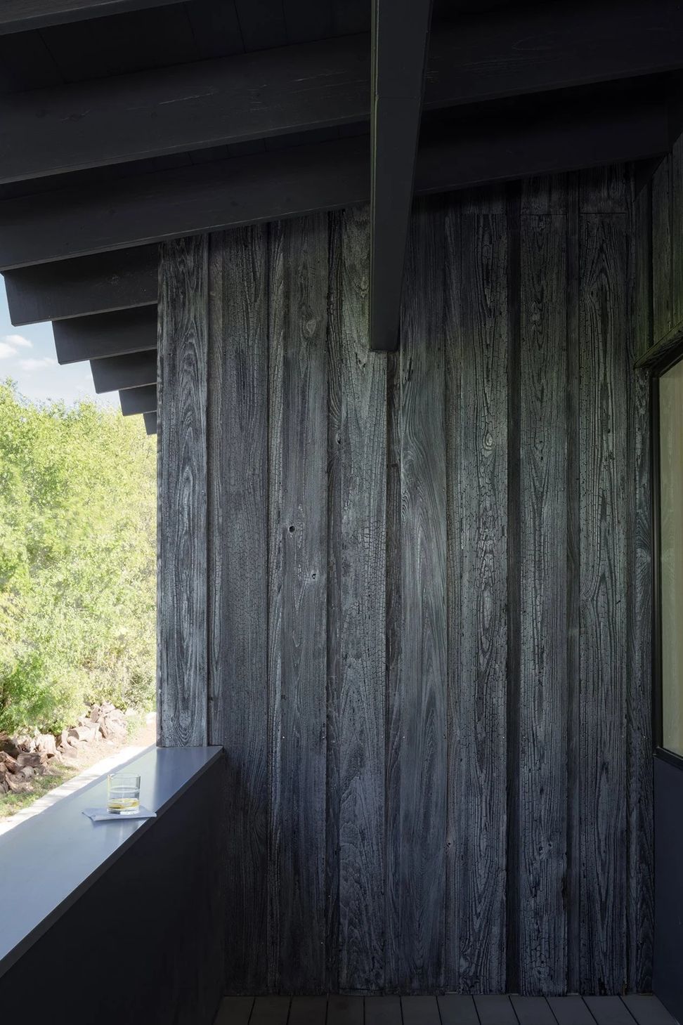 5HillsideCuppettKilpatrickArchitectureandInteriorDesignaustin-tx-balcony-weathered-wood-detail-ap-compressed.jpg
