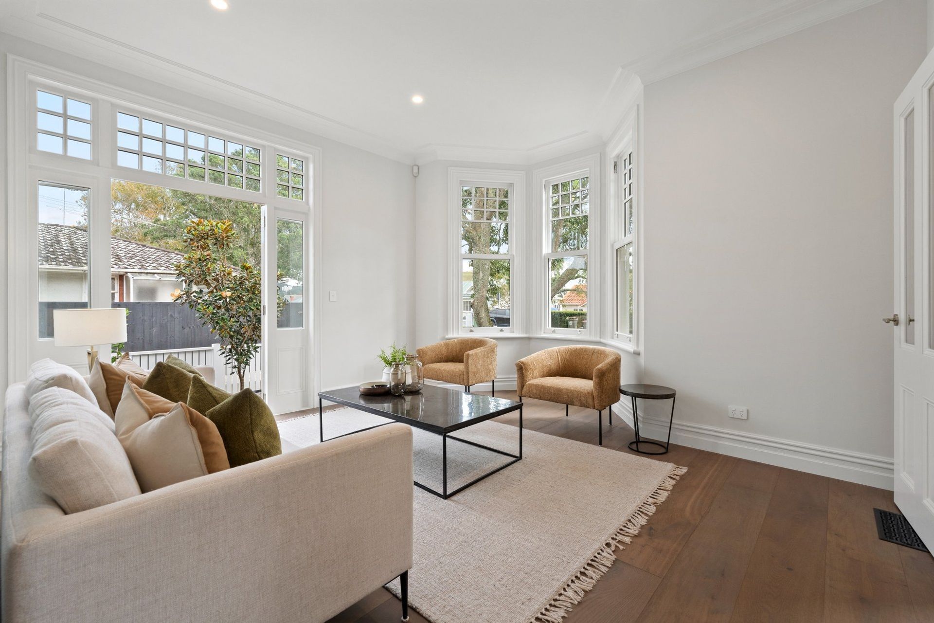 6811eb6ebd8873ca1d6ba351heritage-villa-living-room-modern-staged.jpg