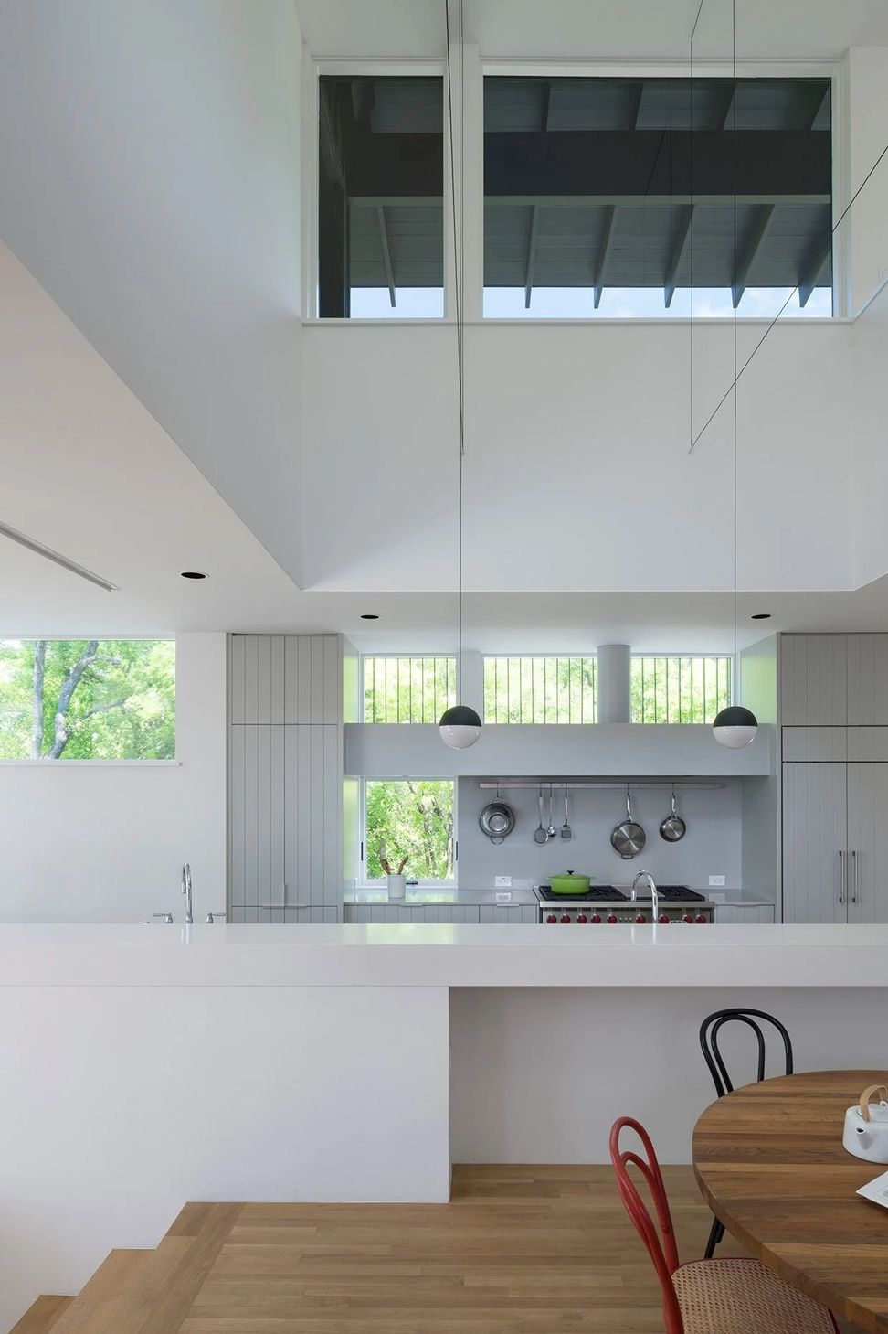 6HillsideCuppettKilpatrickArchitectureandInteriorDesignaustin-tx-open-volume-kitchen-staircase-guardrail-ap-compressed.jpg
