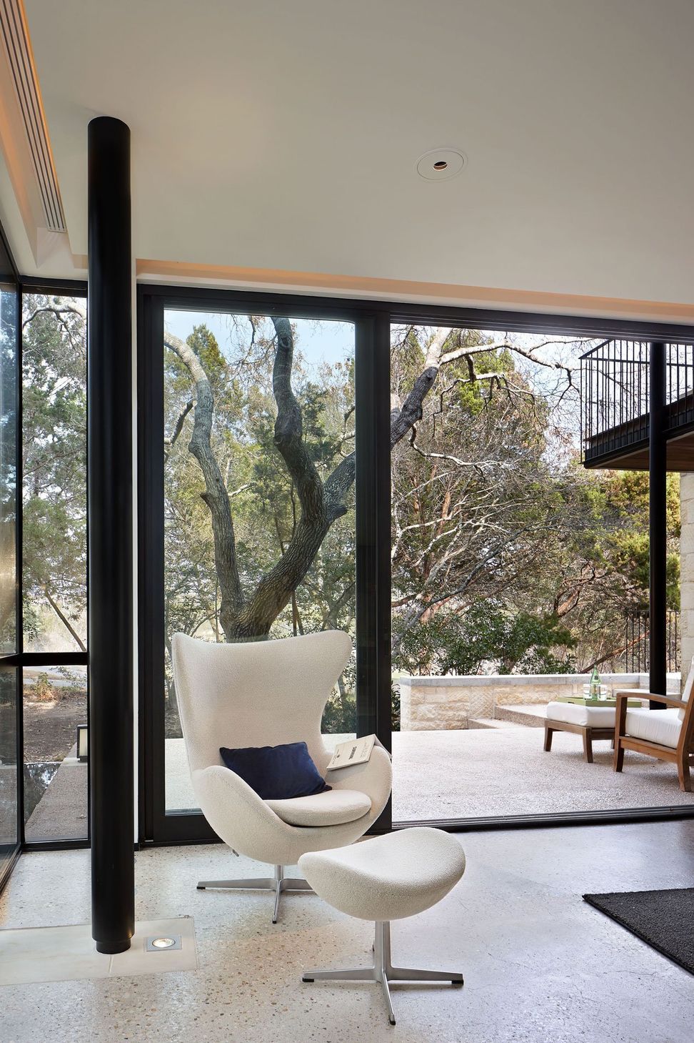 9HouseinTreesCuppettKilpatrickArchitectureandInteriorDesignaustin-tx-contemporary-living-space-nature-view.jpg