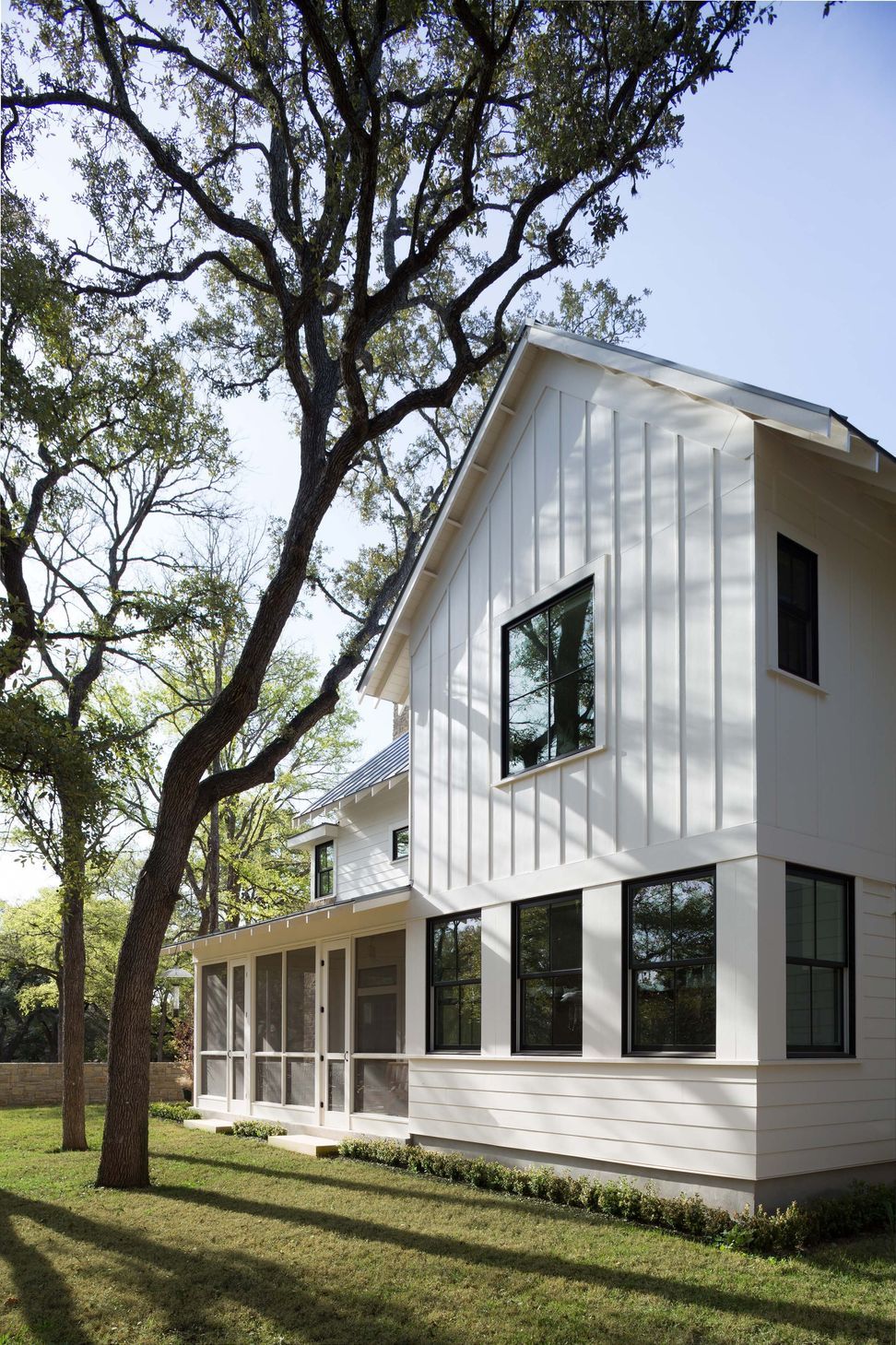 05BunnyRunCuppettKilpatrickArchitectureandInteriorDesignaustin-tx-screened-porch-vertical-siding-large-trees.jpg