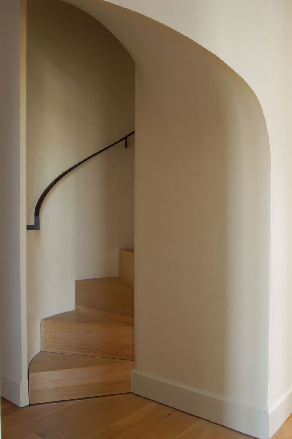 17UrbanHomesteadCuppettKilpatrickArchitectureandInteriorDesignaustin-tx-spiral-staircase-simple-metal-handrail.jpg