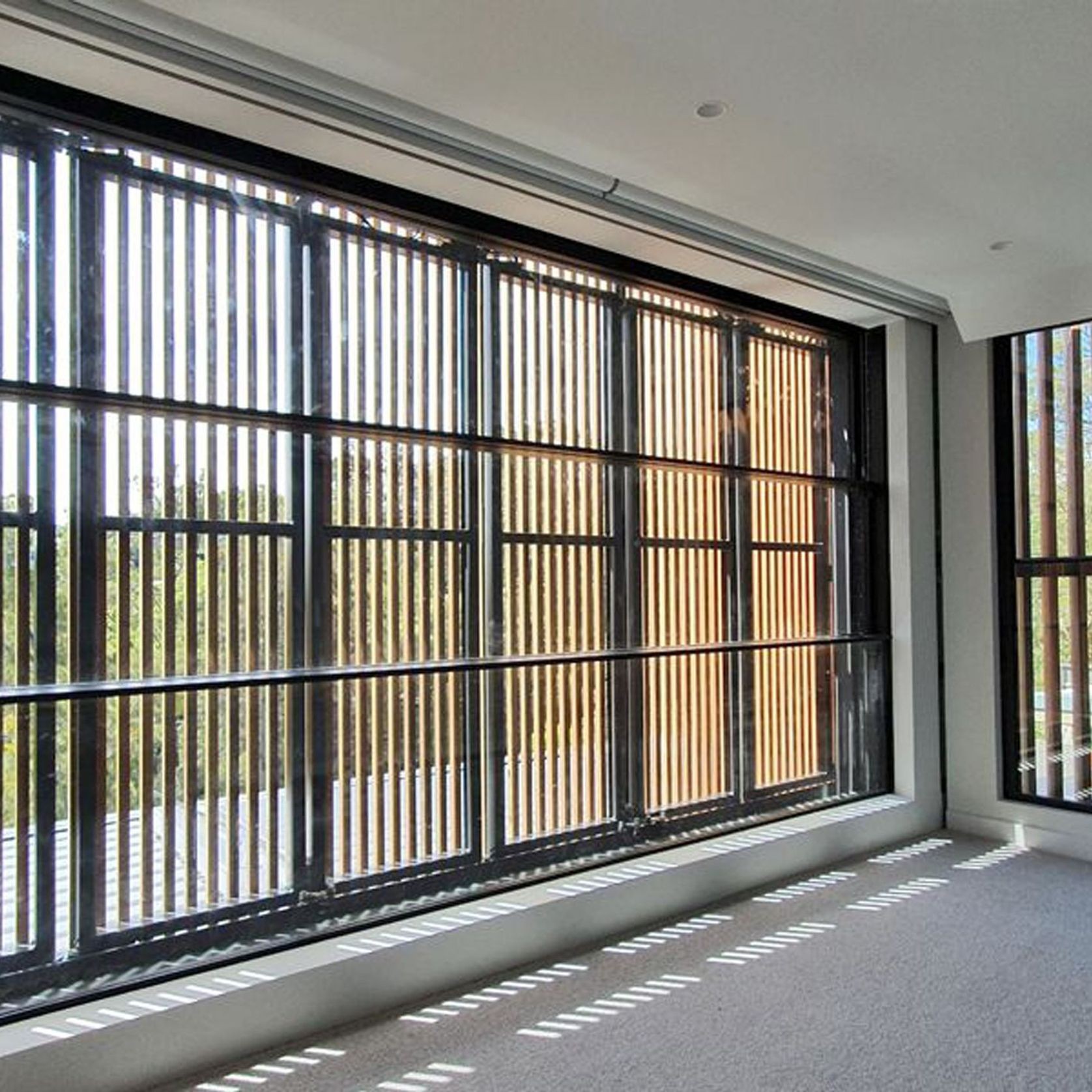 Motorised Vertical Bi-Fold Screens | Shade Factor gallery detail image